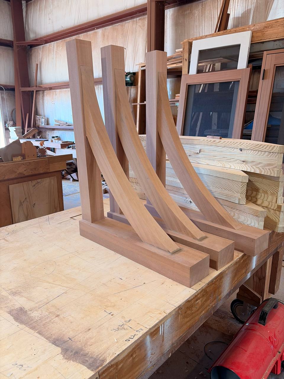 Finished Sapele curved corbel brackets